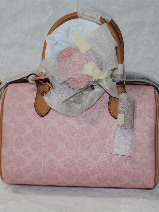 Coach Handbags - NWT Coach Powder Pink Medium Rowan Signature Canvas With Charms